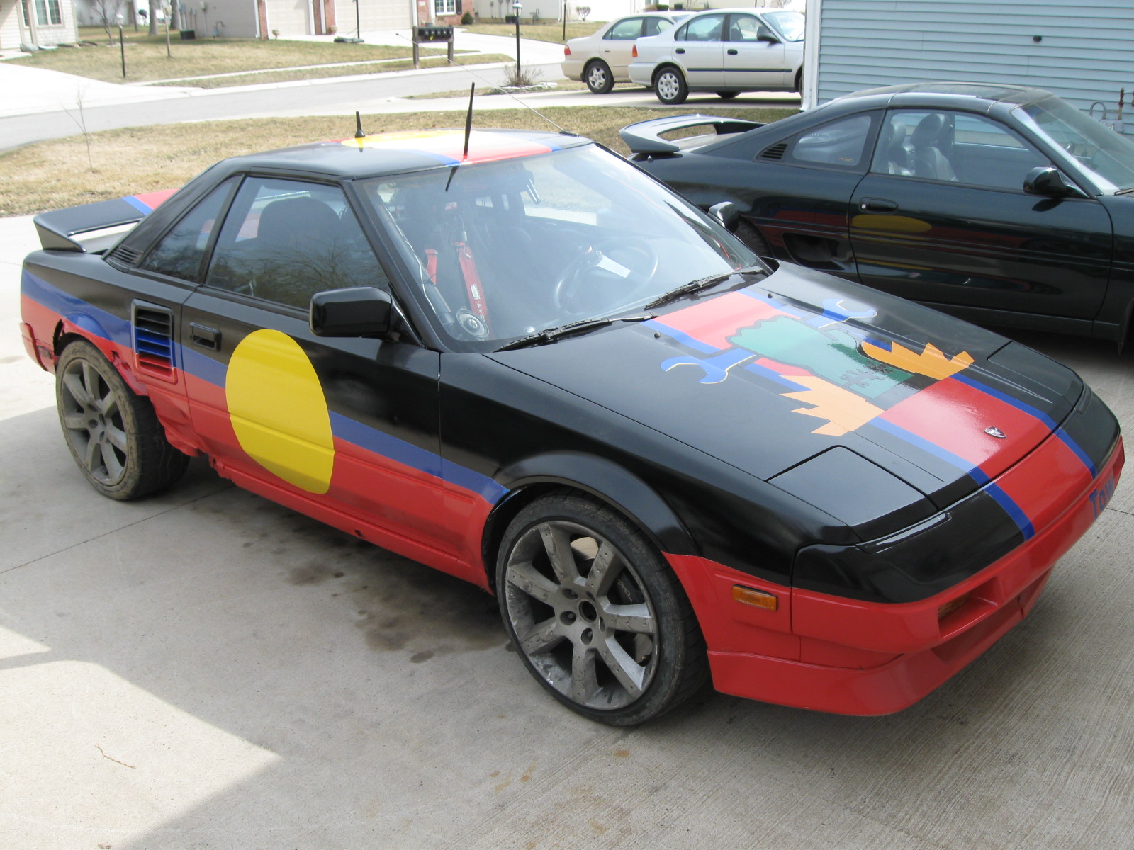 Spray paint? Single stage automotive ends up being cheaper and easier